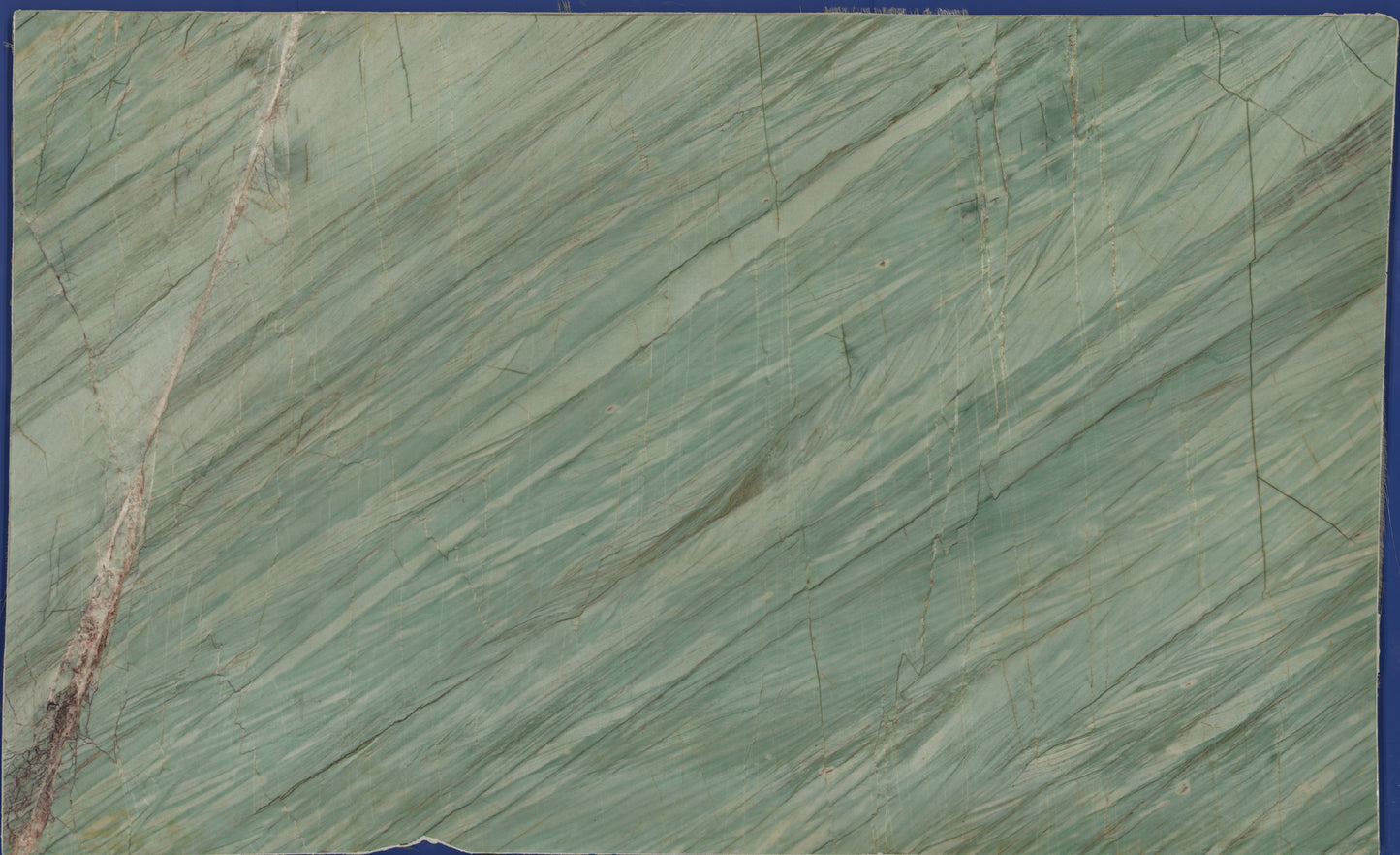 Green marble tile with veining pattern