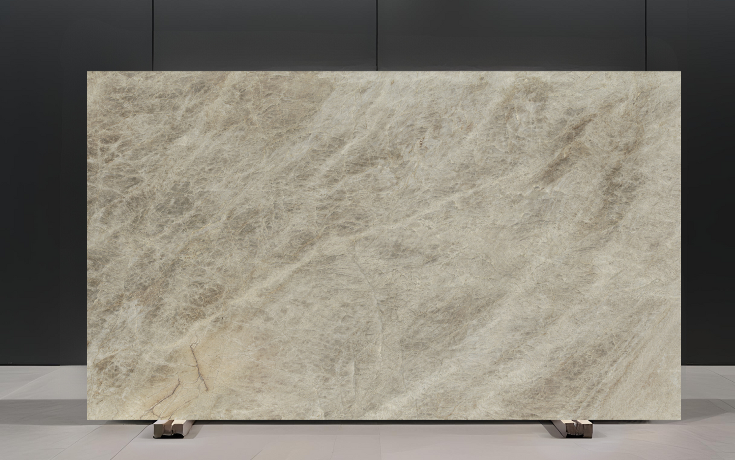 Large beige marble slab on a black background